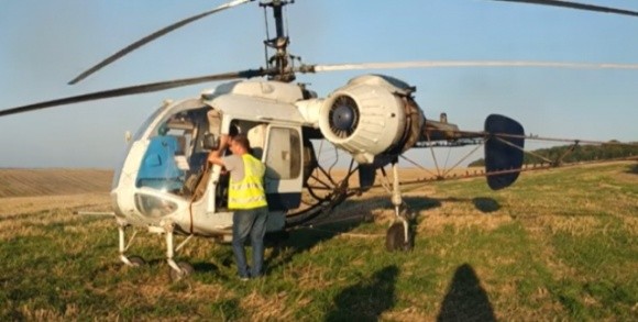 На Рівненщині активісти затримали гелікоптер, яким незаконно обробляли посіви соняшника фото, ілюстрація